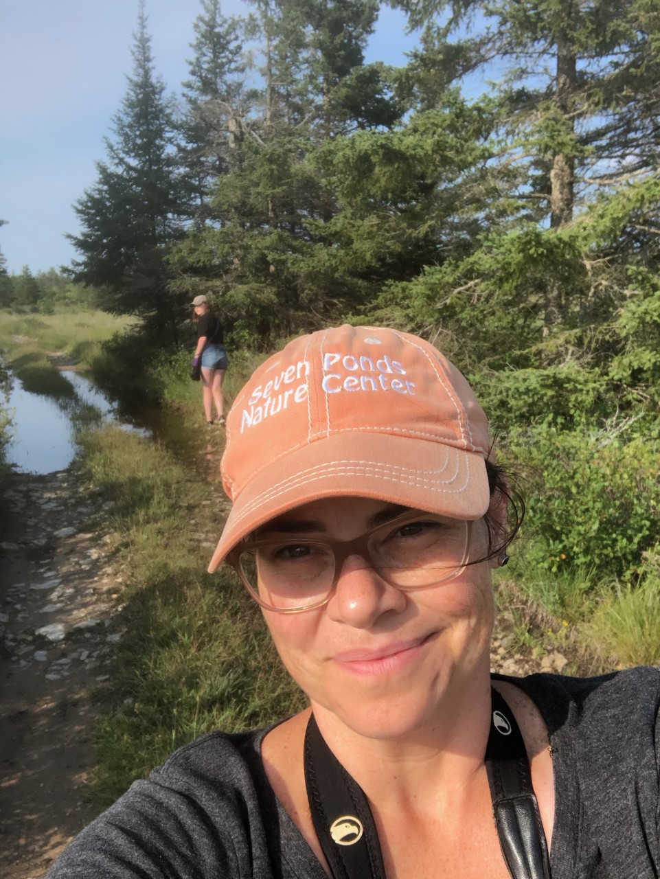 Carrie hiking Maxon Plains on Drummond Island