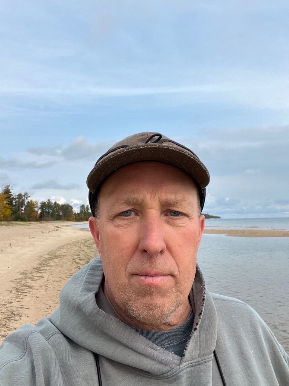 Daryl trekking along the Lake Michigan shoreline in da UP
