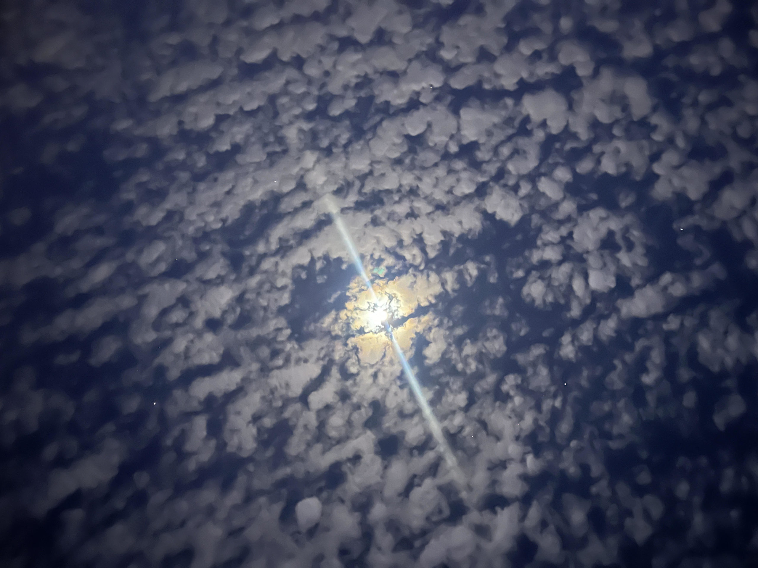 Moonlight through the clouds just before dawn