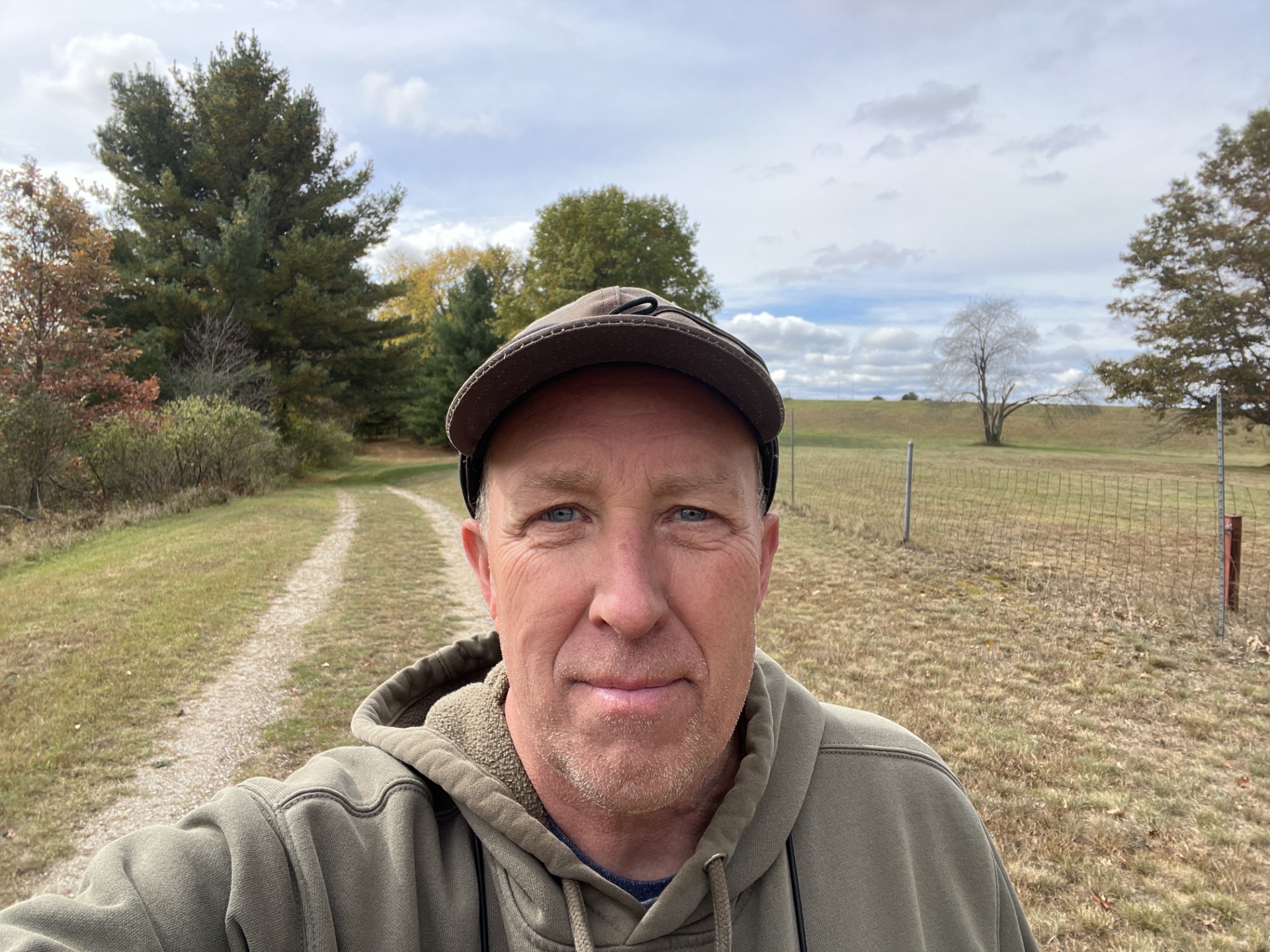 Daryl trekking the Evart Nature Trail on a crisp October day