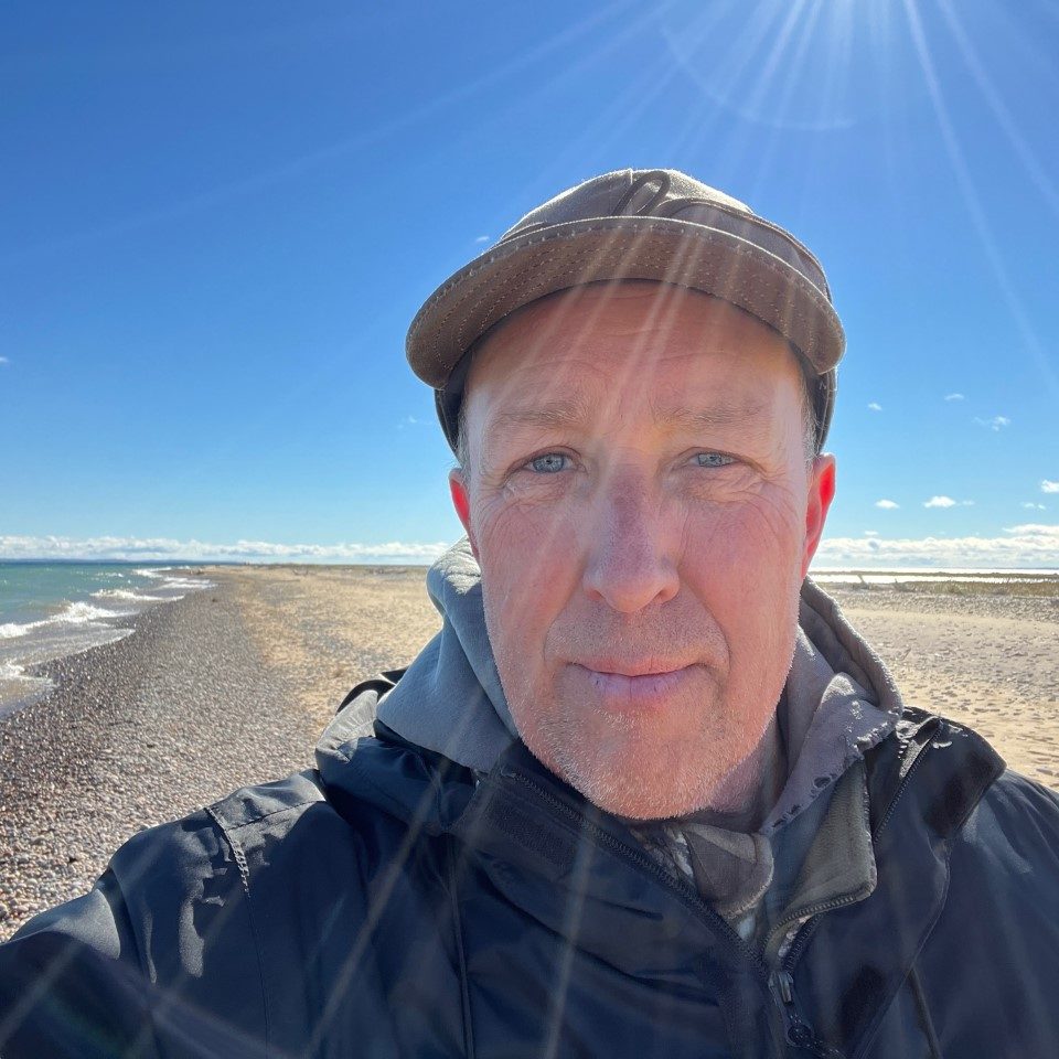 Daryl trekking the Lake Superior shoreline